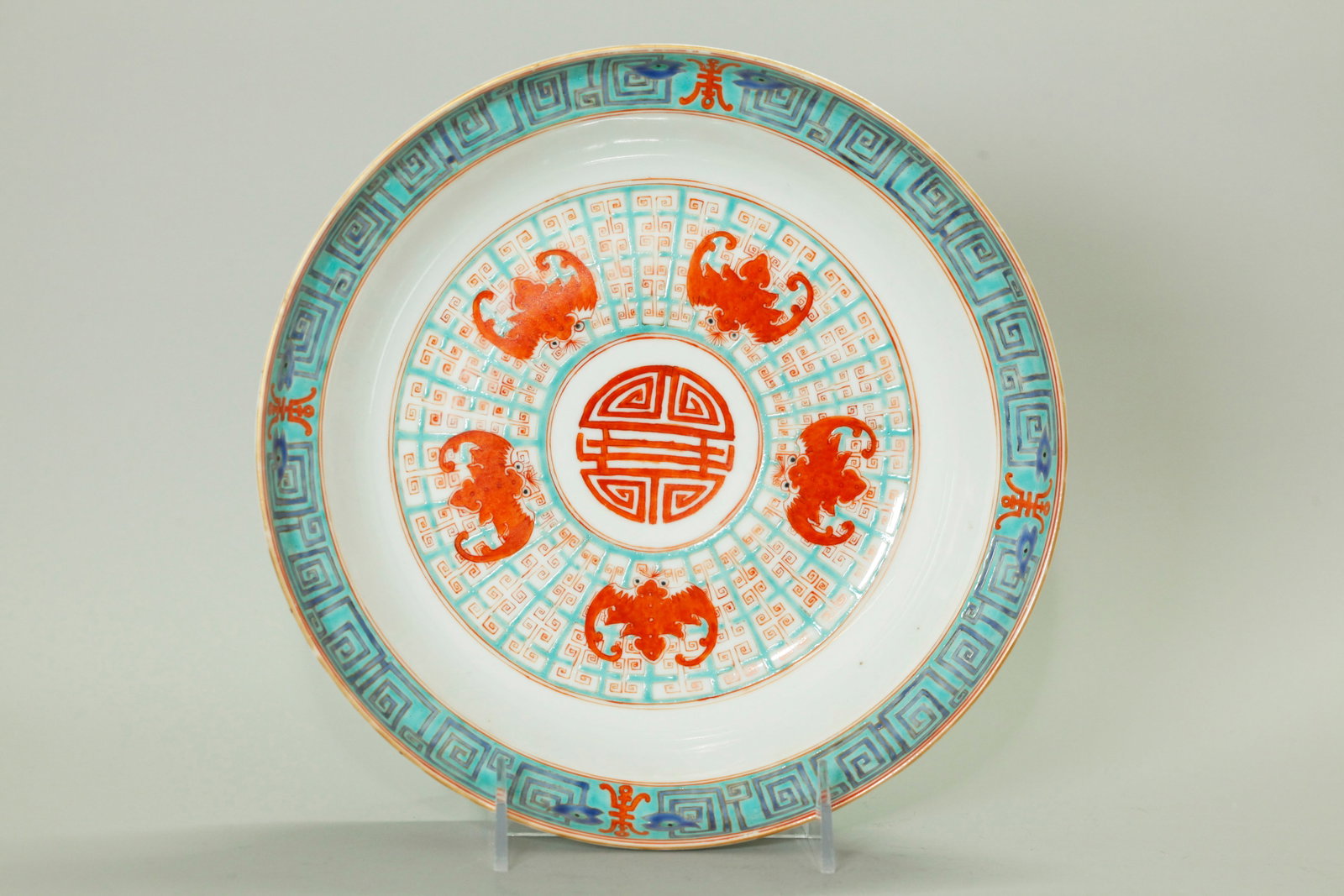 Chinese Qing Turquoise & Iron Red Porcelain Bowl: Chinese Qing Dynasty Turquoise & Iron Red Porcelain Low Bowl with ogee sides and a design to the center of 5 large Bats in iron red around a Shou Medallion in iron red, the outside edge in blue on tur