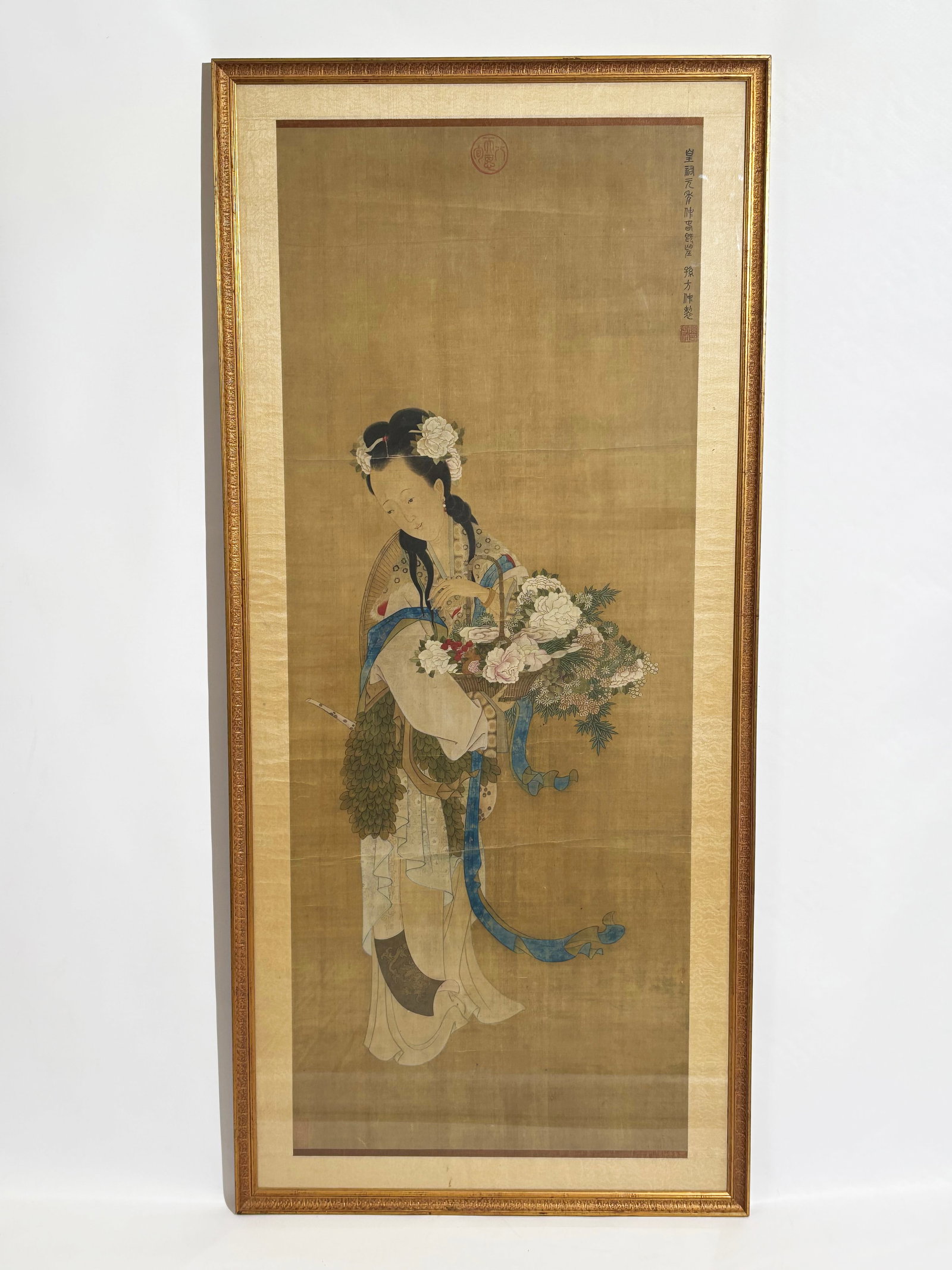 Chinese 18th/19th C Beautiful Lady silk Painting: Chinese 18th or 19th Century silk painting in ink and colors of Magu with basket of Fruit and Flowers, a bamboo hat, and wearing robes with leaves, fur and silk, with seal script inscription to upper 