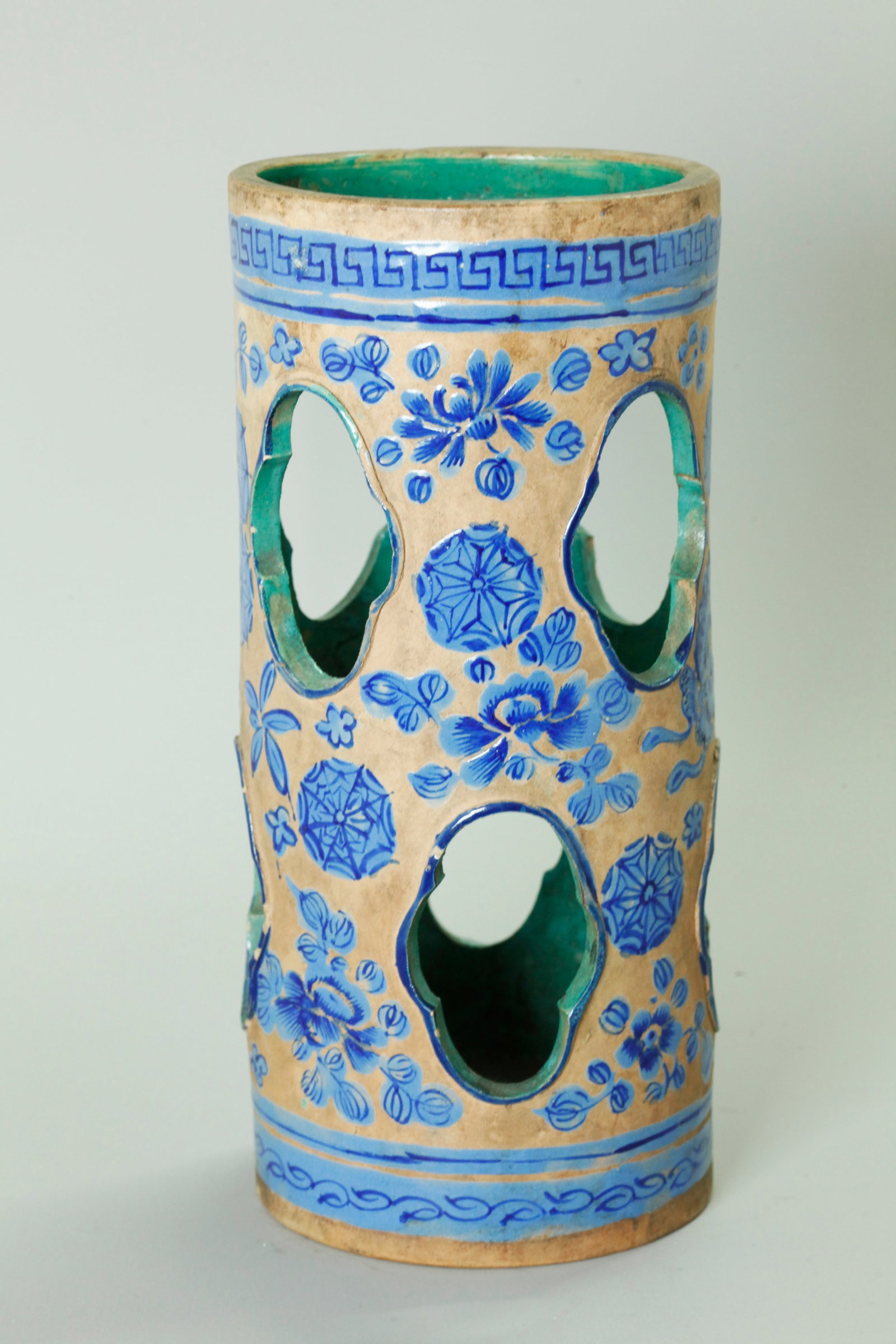 Rare Chinese 19 C Enameled Yixing Zisha Hat Stand: Rare Chinese mid 19th Century Enameled light clay Yixing Zisha Ceramic Hat Stand pierced to the sides with 8 quatrefoil air-circulation windows between sides enameled blue with butterflies, flowers an