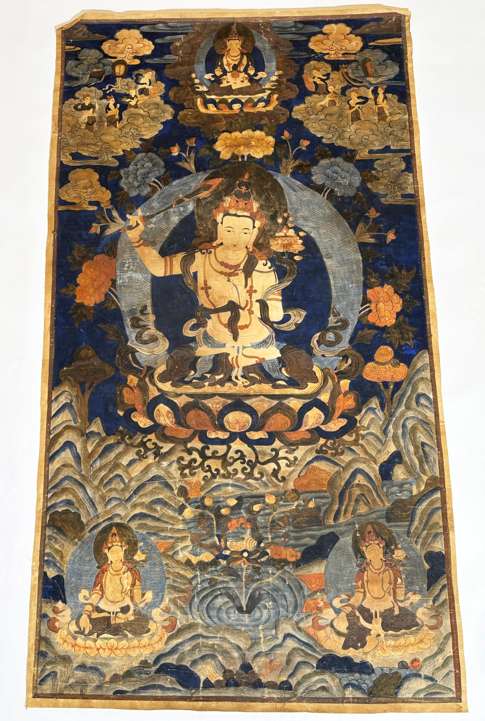 Lg Tibetan 20th Century Manjushri Thangka: Large Tibetan 20th Century Manjushri Thangka with inscription on back. Height 57 inches X width 31 1/2 inches. Estate/Collection: Property from an Esteemed New York Collection.
