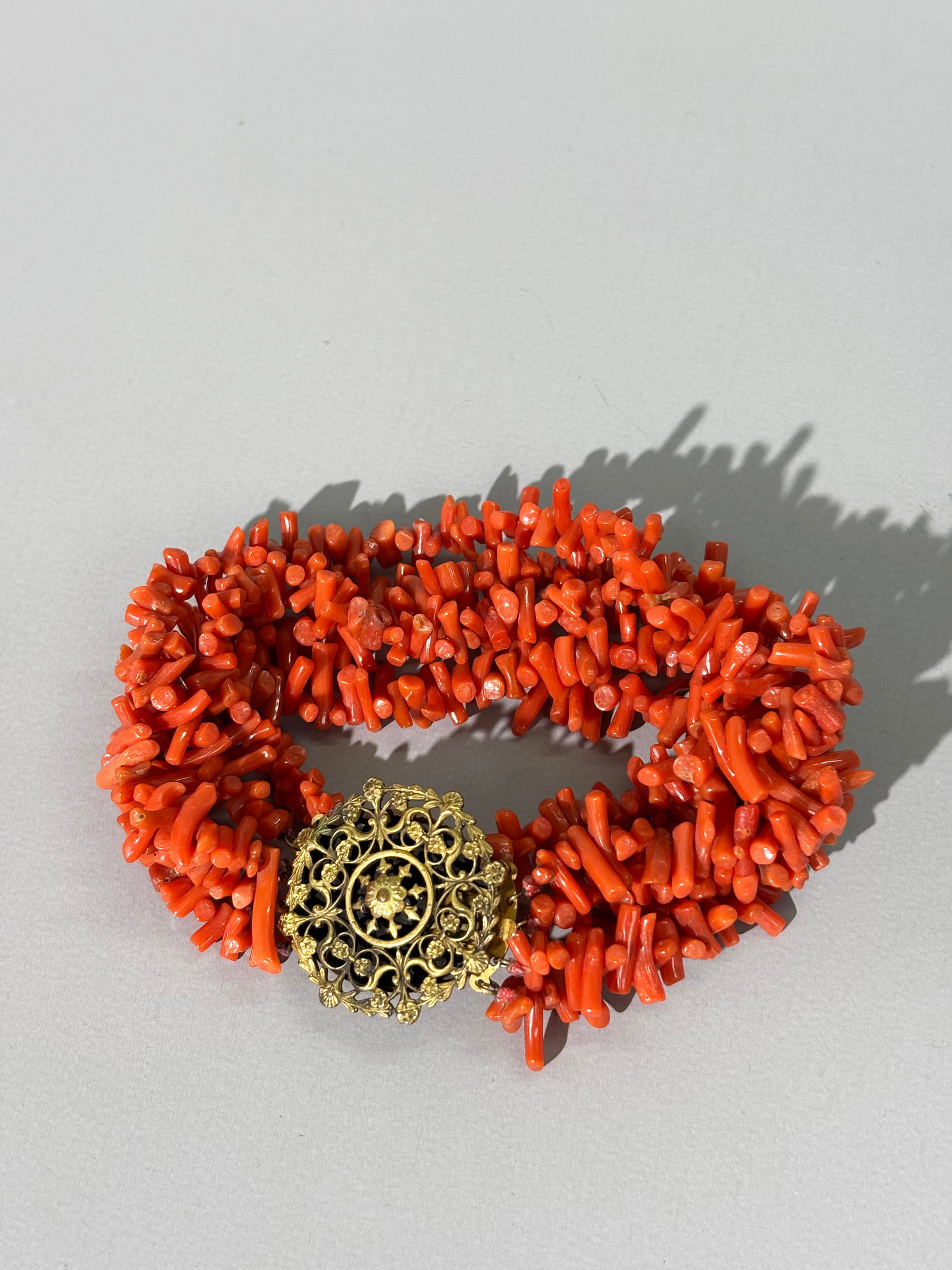 Vintage 5 Strand Branch Coral Bracelet: Vintage 5 Strand Branch Coral Bracelet; gilt Filigree Closure. Total weight 50 grams. Length 8 1/2 inches.