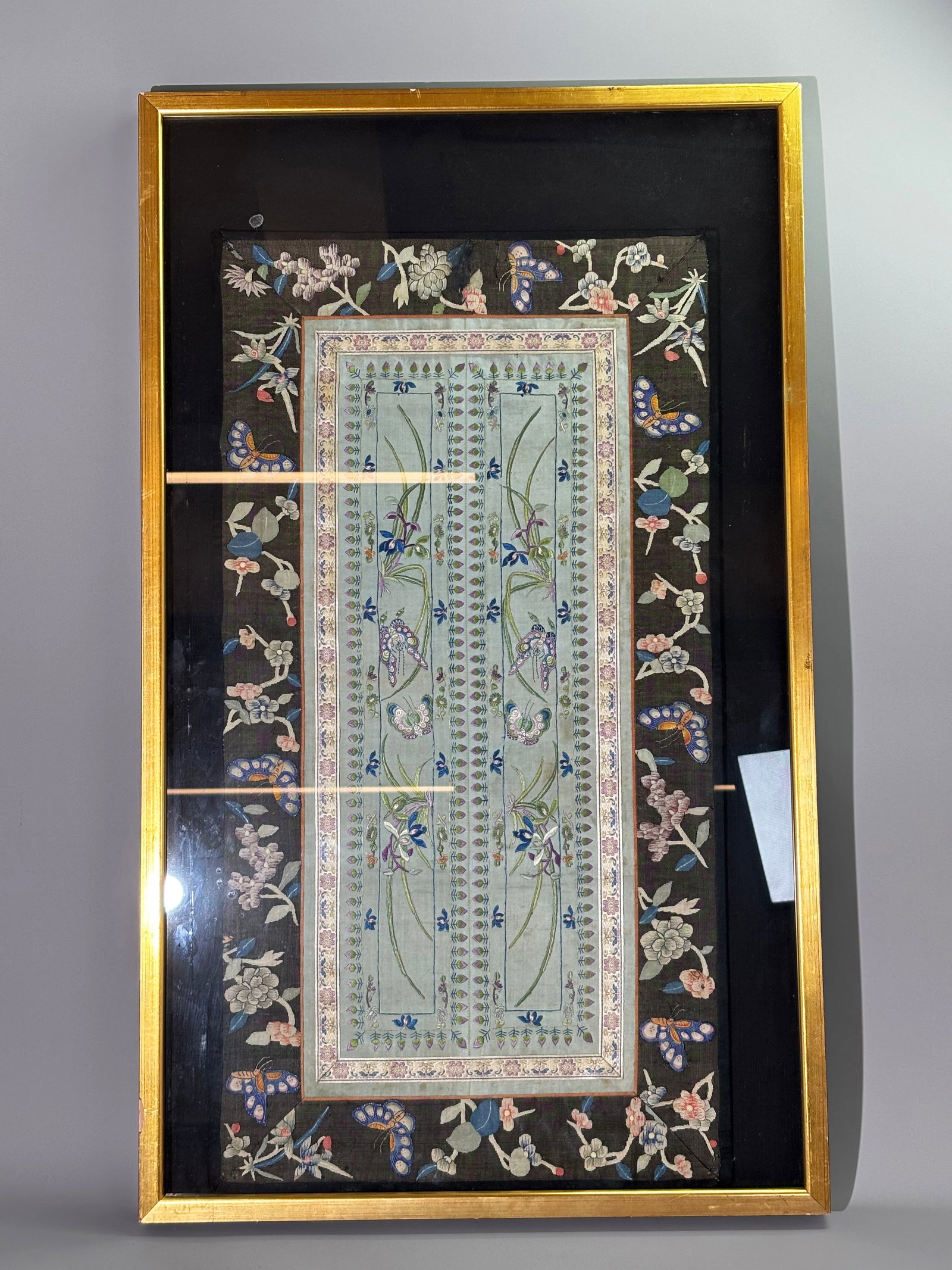 Fine Pr Chinese Qing Sleeve Bands & Kesi Borders: Fine Pair Chinese Qing Dynasty Sleeve Bands well embroidered with Orchids and Butterflies with a Lotus Bud edge, now sewn together with ribbon edging and mounted with wide Kesi painted-detail tapestry