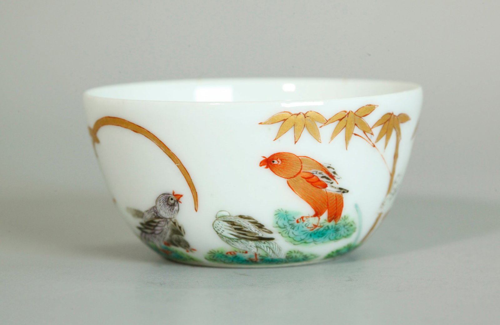 Fine Rare Chinese 19C Shen De Tang Porcelain Cup: Fine & Rare Chinese 19th Century Famille Rose enameled & gilt Porcelain Cup with a design of 5 colored Pigeons in a Garden with gilt Orchid & Bamboo; with interior and recessed base in clear glaze wit