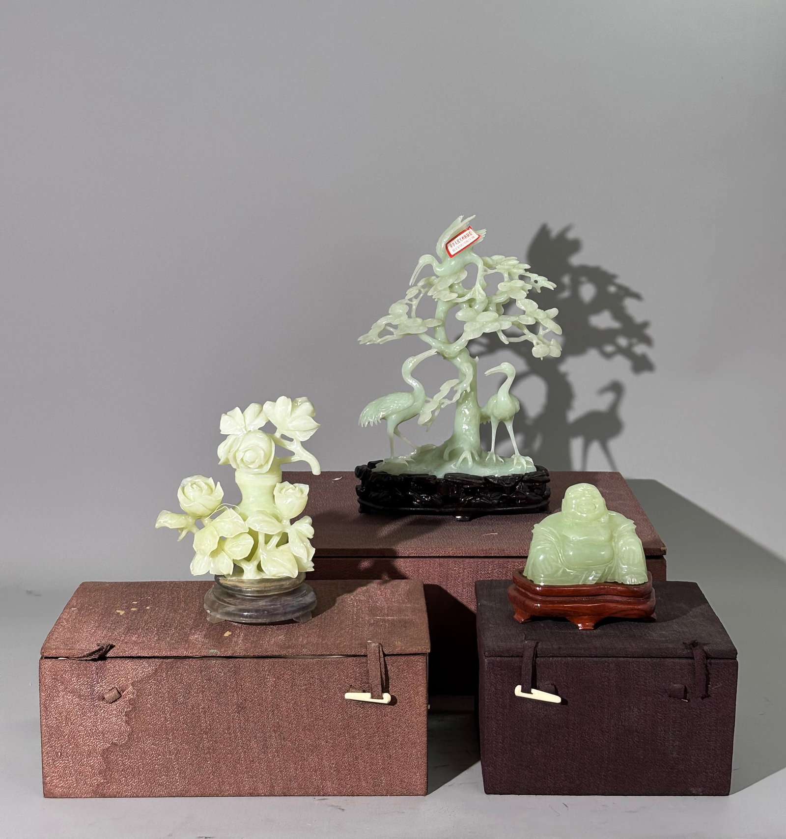 3 Good Chinese Polished Pale Celadon Carvings: 3 Good Chinese Polished Pale Celadon Carvings, probably in translucent Serpentine: the largest a Pine Tree with 3 long-life Cranes with carved wood stand and custom storage box; a polished, covered sm
