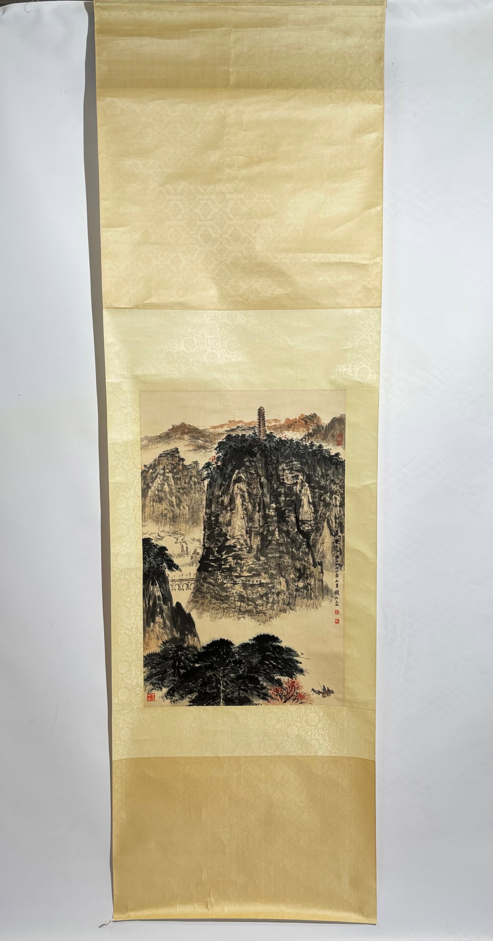 QIAN SONGYAN (1899-1985), Chinese Landscape Scroll: QIAN SONGYAN (1899-1985), Chinese Landscape Scroll "Yan'an Morning Melody"; A hanging scroll ink and color on paper, depicting the sacred Yan?an landscape. The composition centers on the towering moun