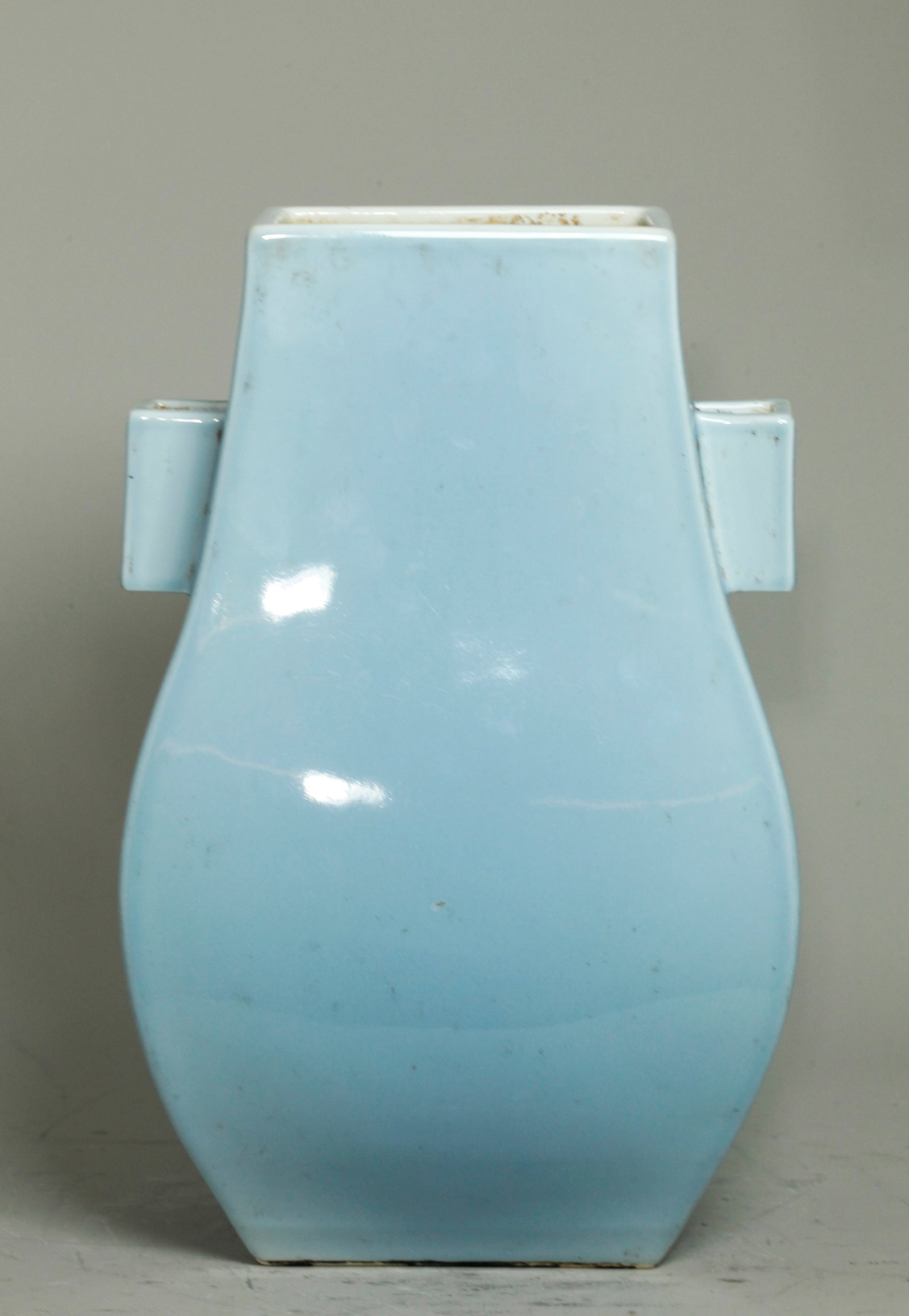 Lg Chinese Clair De Lune Porcelain Hu Vase: Large Chinese Clair De Lune pale blue monochrome Porcelain flattened 4 sided Hu Vase with 3 panel tube handles, the recessed base with a 6 character Qianlong seal mark in underglaze blue, the rectangu