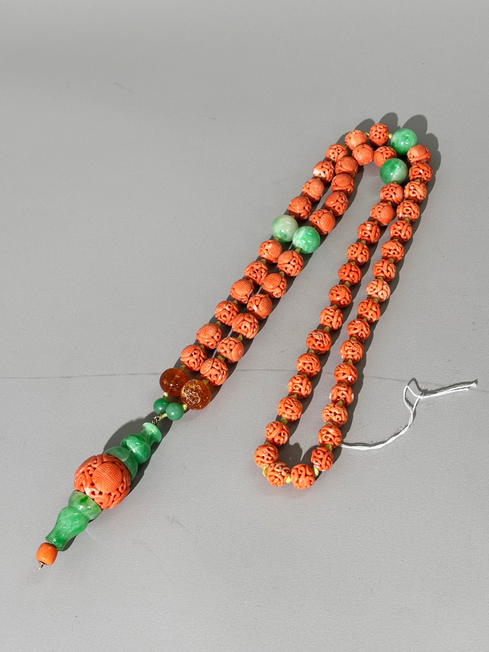 Chinese Chaozhu Parts 55 Sm Coral Beads 1 Large: Chinese Qing Dynasty Chaozhu Court Necklace Parts: 27 Small Coral Beads carved & pierced with Shou Roundels and Curls and 28 small corals carved & pierced with Dragons, 1 Large coral bead carved & pie