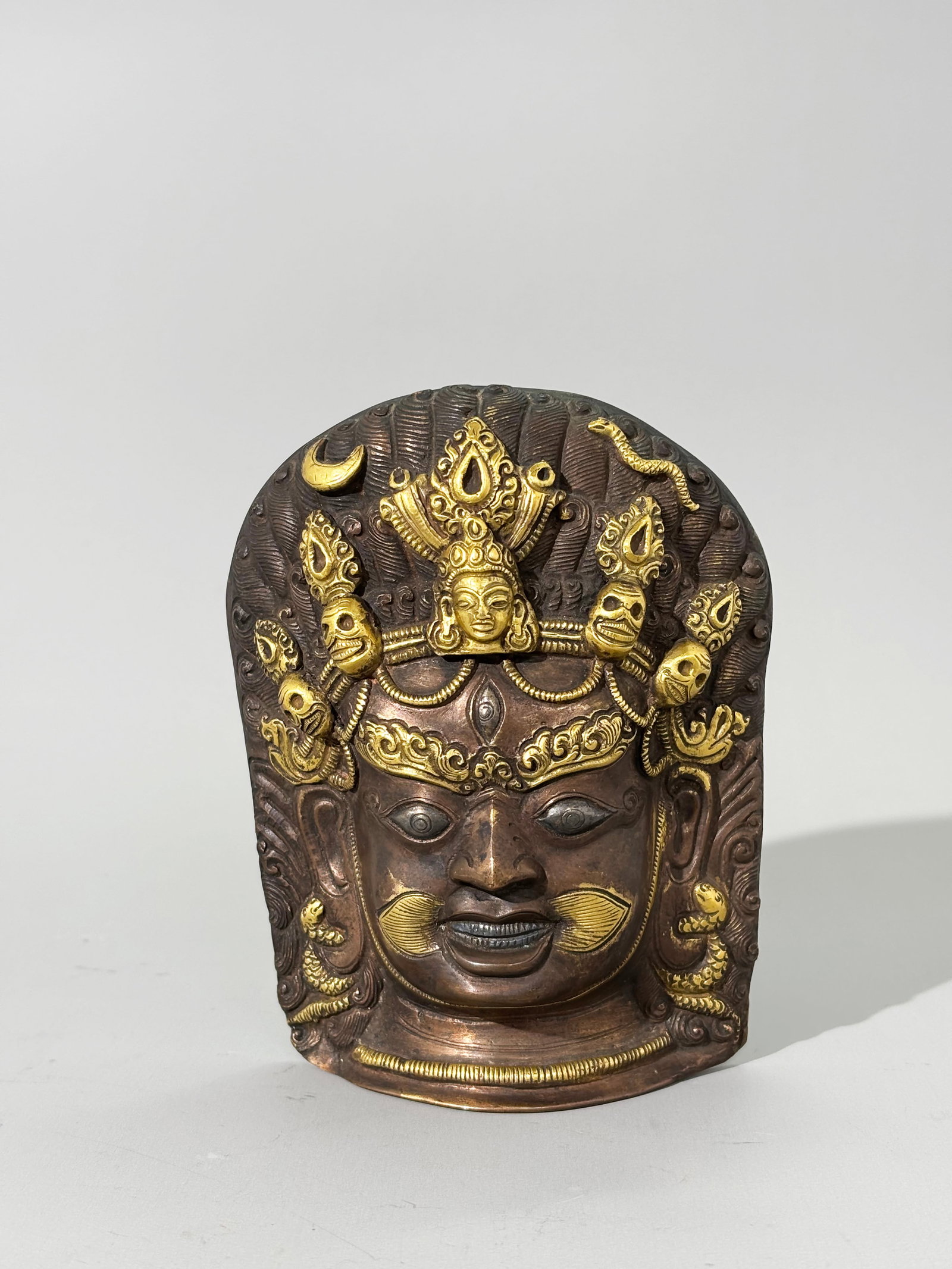 Tibetan Bronze, Gold, Silver Mask: Tibetan Bronze, Gold, Silver Mask. Height 5 1/2 inches x width 4 1/8 inches.