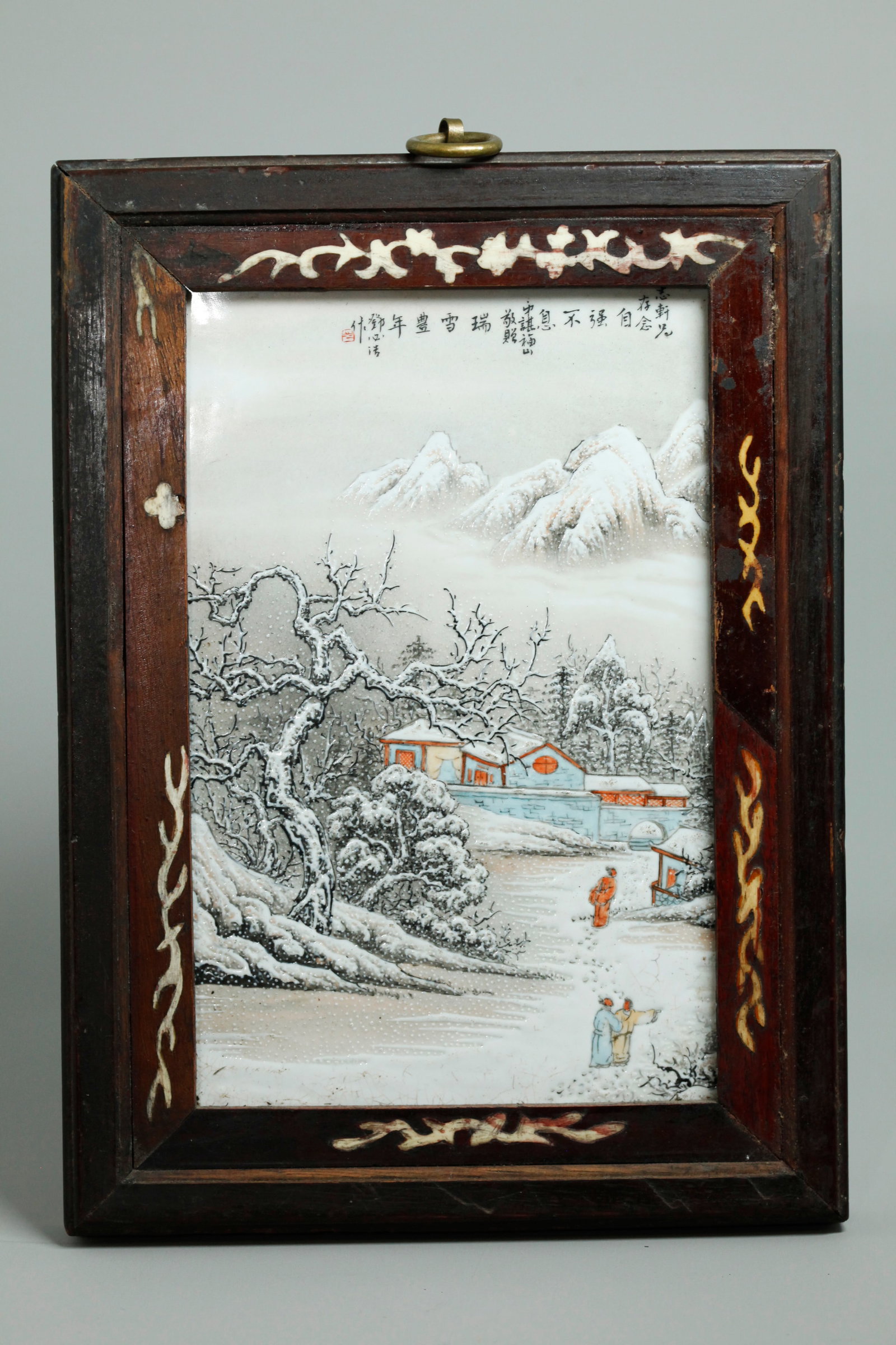 Chinese Artist Enamel Porcelain Plaque Snow View: Chinese Artist Enameled Porcelain Plaque of 3 Scholars in the Snow at a Mountain Viewing Retreat; calligraphy inscription and 1 red seal across top edge; framed with old inlaid wood molding and a bron