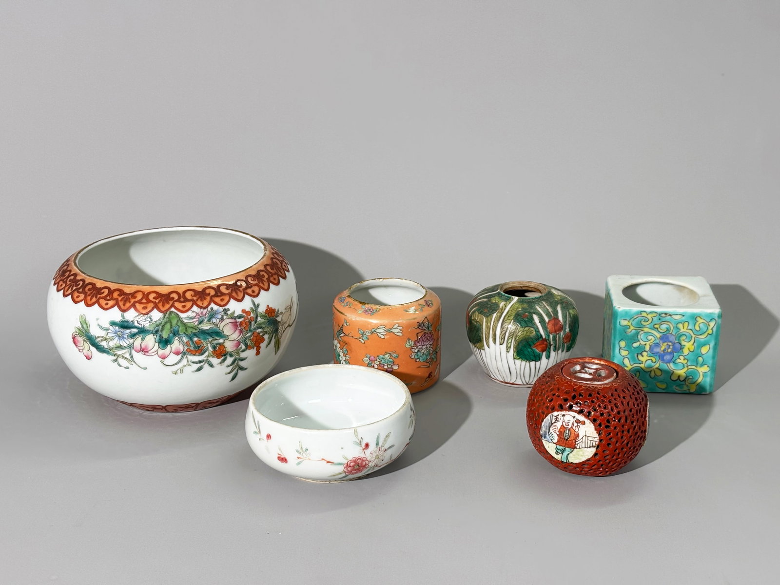 6 Chinese Qing Enameled Porcelain Containers: 6 Chinese Qing Dynaty Enameled Porcelain Containers: a pierced Perfume Ball with cover and center hole through cover and bottom for suspension in turquoise and iron red; a "brush washer" type bowl wit