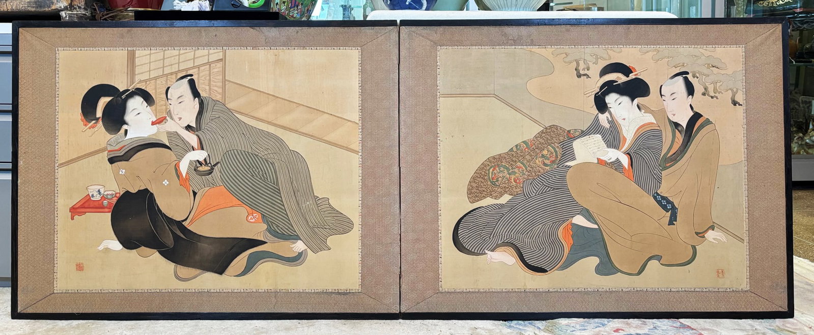 Japanese 2 Panel Romantic Shunga Low Screen: Japanese 2 Panel Romantic Shunga Low Screen, each side with an amorous couple sharing wine or poetry, painted on silk with 1 red seal to each side; brocade borders and wood frame, the reverse side in 