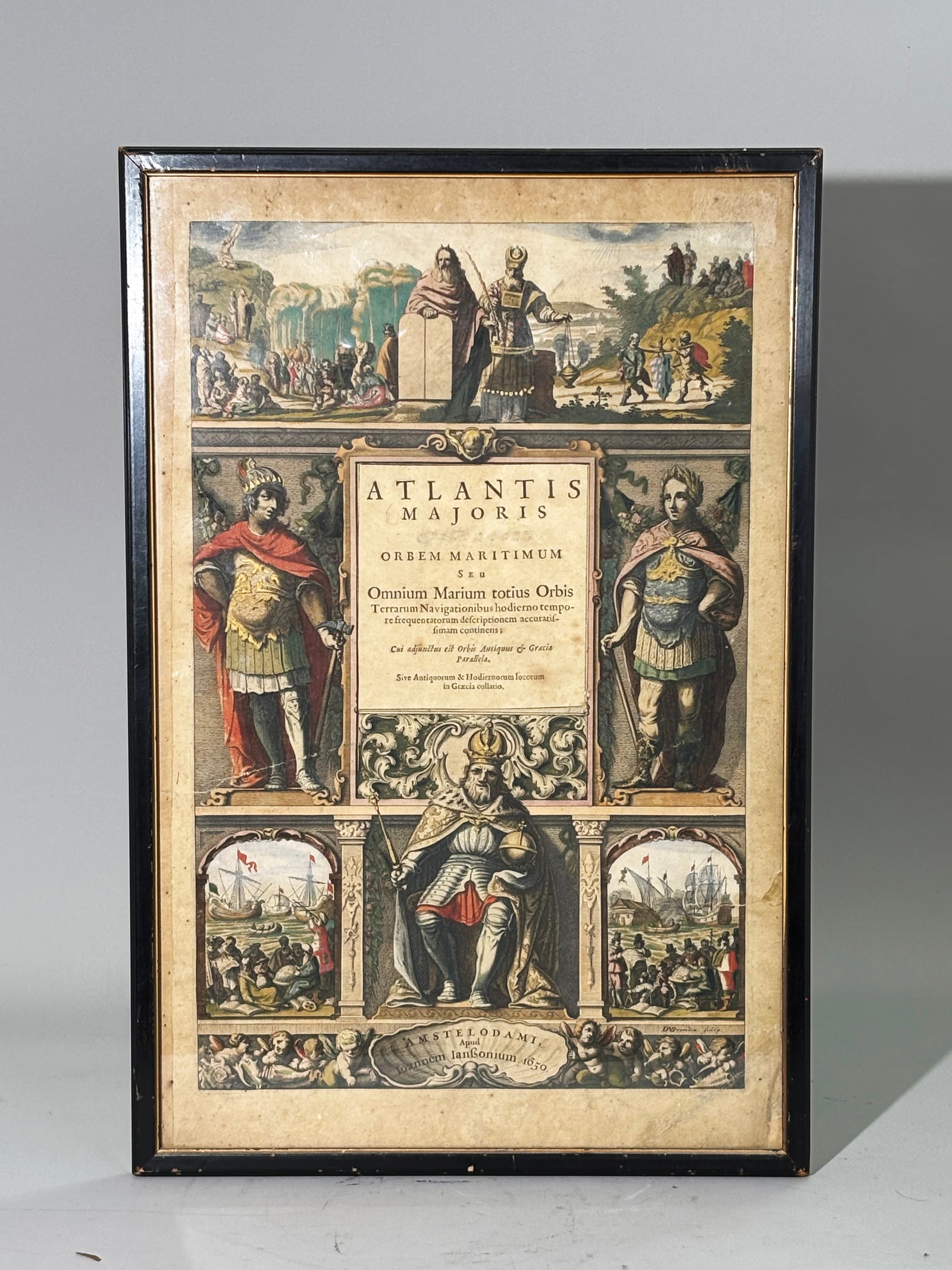 Hand Colored 1650 Title Page Etching "Atlantis": Original Hand-colored engraved title page from Johannes Jansson's 1650 "Atlantis Majoris ('Quinta Pars' is rubbed out), Orbem Maritimum." It serves as the opening for the fifth volume of his landmark