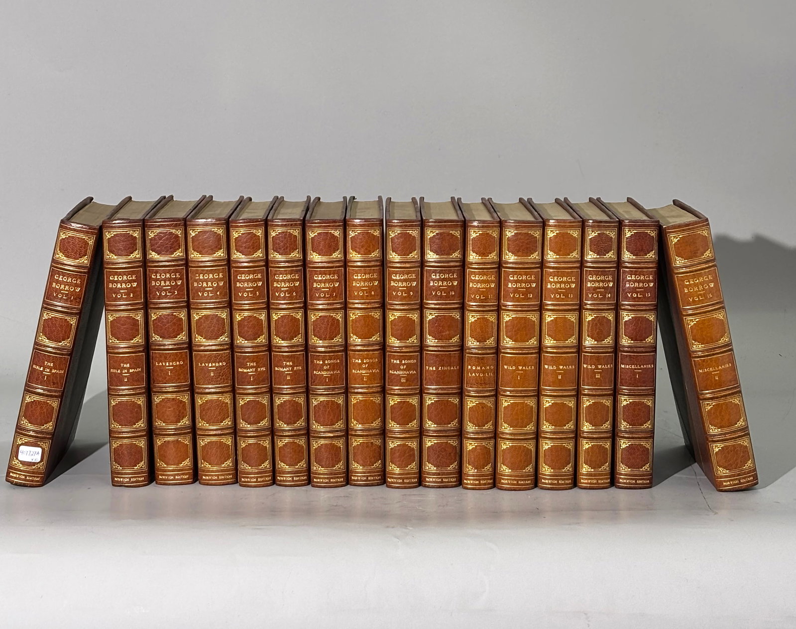 16 Vol George Borrow Fine Limited Norwich Edition: 16 Vol George Henry Borrow (1803-1881); Fine Limited Norwich Edition in gilt half-calf and linen, numbered in ink to Volume 1 as set 468/775, printed by Constable & Co Ltd, London / Gabriel Wells, New