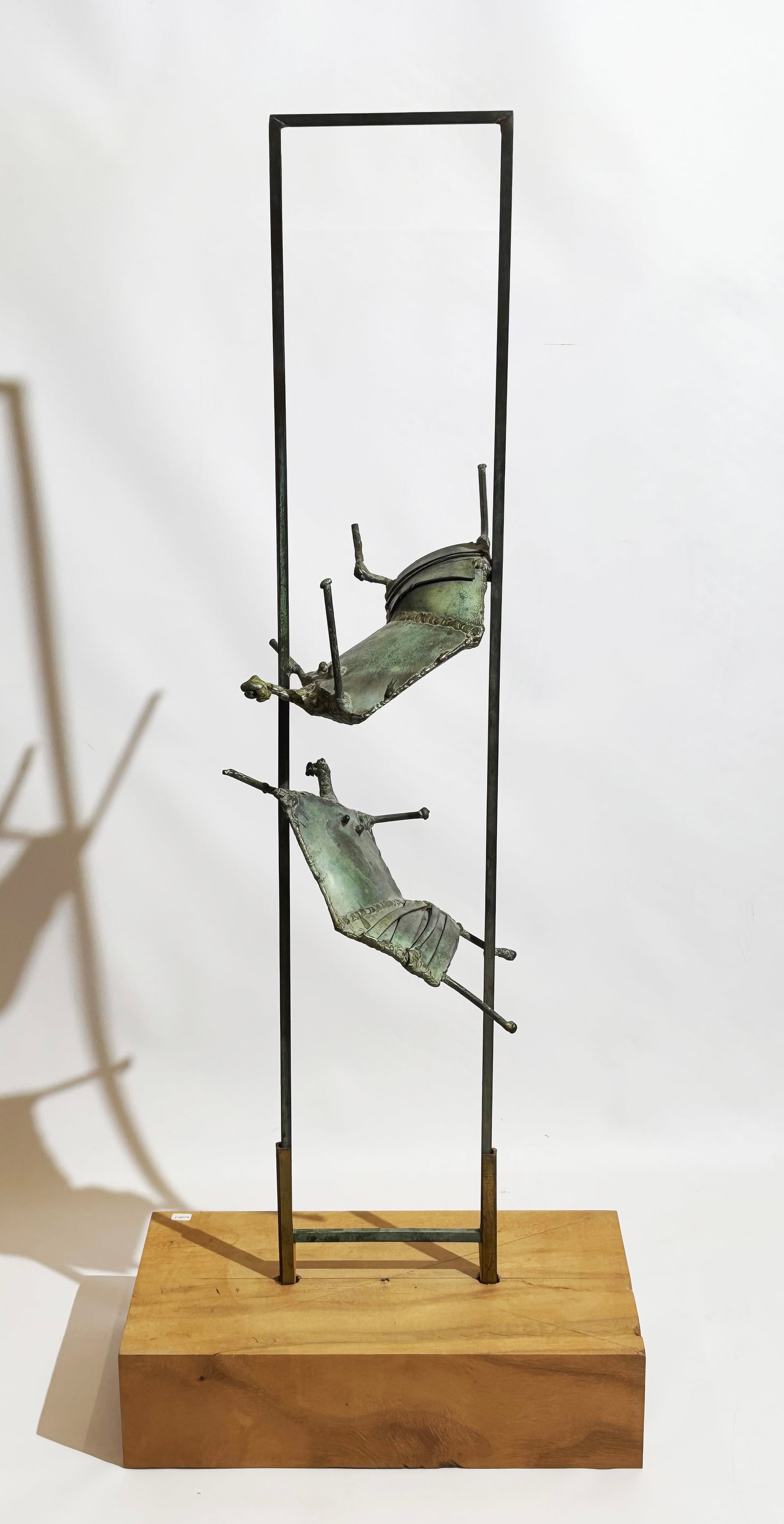 Mid 20 Century Brutalist Bronze 2 Floating Women: Large Mid 20th Century Brutalist Bronze; 2 Floating Women between 2 bronze uprights mounted into a large rectangular block of hard wood. Total height 45 inches X width of base 18 inches X depth 10 inc