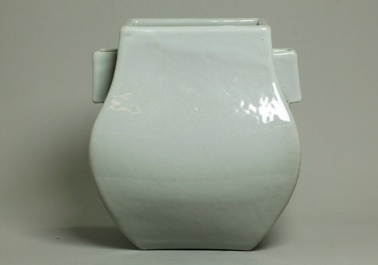 Chinese Bluish-Clear Glazed Porcelain Hu Vase: Chinese Bluish-Clear Glazed Porcelain Hu Vase with cornered tube handles to the short sides, the glaze ending clean of the rectangular unglazed foot ring and the recessed base with 6 character Yongzhe