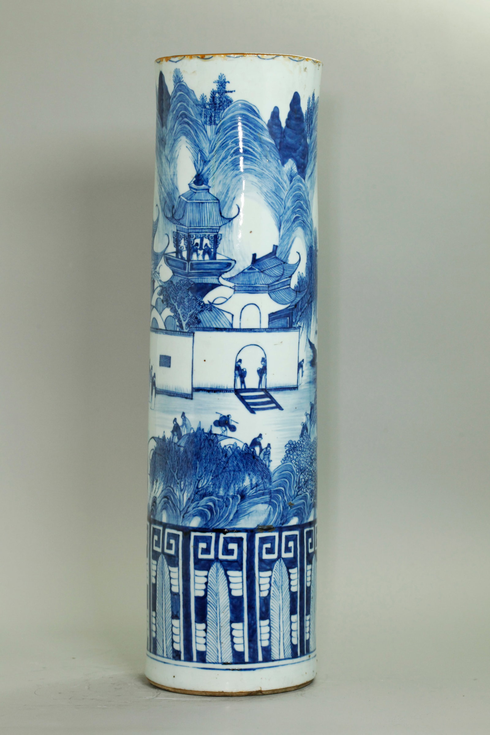 Chinese Tall Narrow Blue Porcelain Umbrella Stand: Chinese Tall unusually narrow Blue & White Porcelain Umbrella Stand; the design to the outside of a Mountain Temple Complex with gardens and figures arriving and departing, the bottom with an unusual 