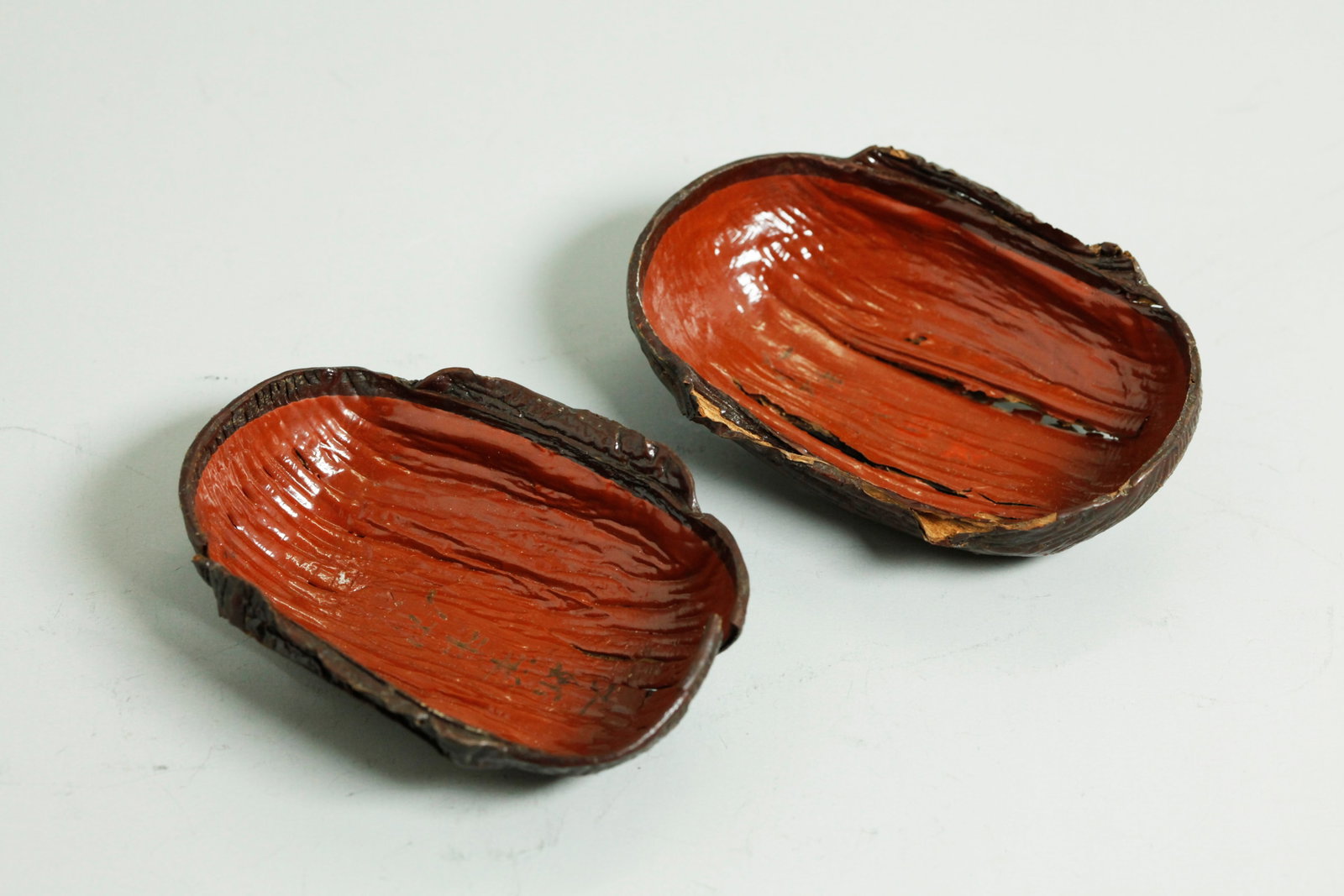 V Rare Pr Chinese Han Lacquer Ear Cups Exhibited: Very Rare Pair Chinese Han Dynasty Lacquer Ear Cups formerly on Exhibition twice in Hong Kong in 1993 and 2010, the wood body covered on the exterior, ears and interior rim with a pale brownish-black 
