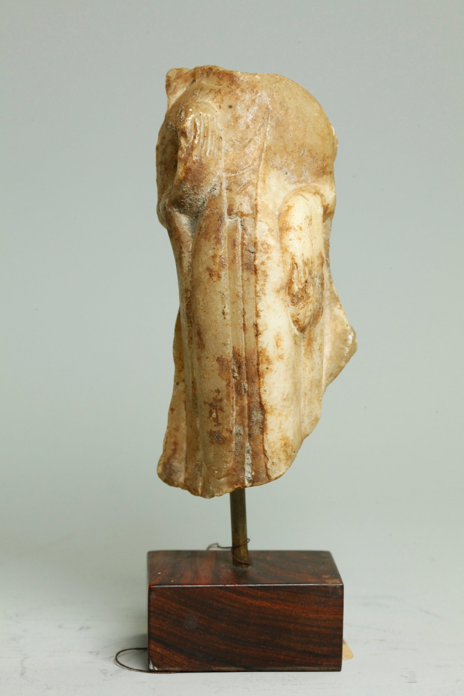 Chinese Sui To Tang Dynasty Marble Bodhisattva: Chinese Sui To Tang Dynasty white Marble Bodhisattva fragment missing head and base, the back polished flat with chipped side edges suggesting the figure formerly was surrounded by a petal-shaped mand