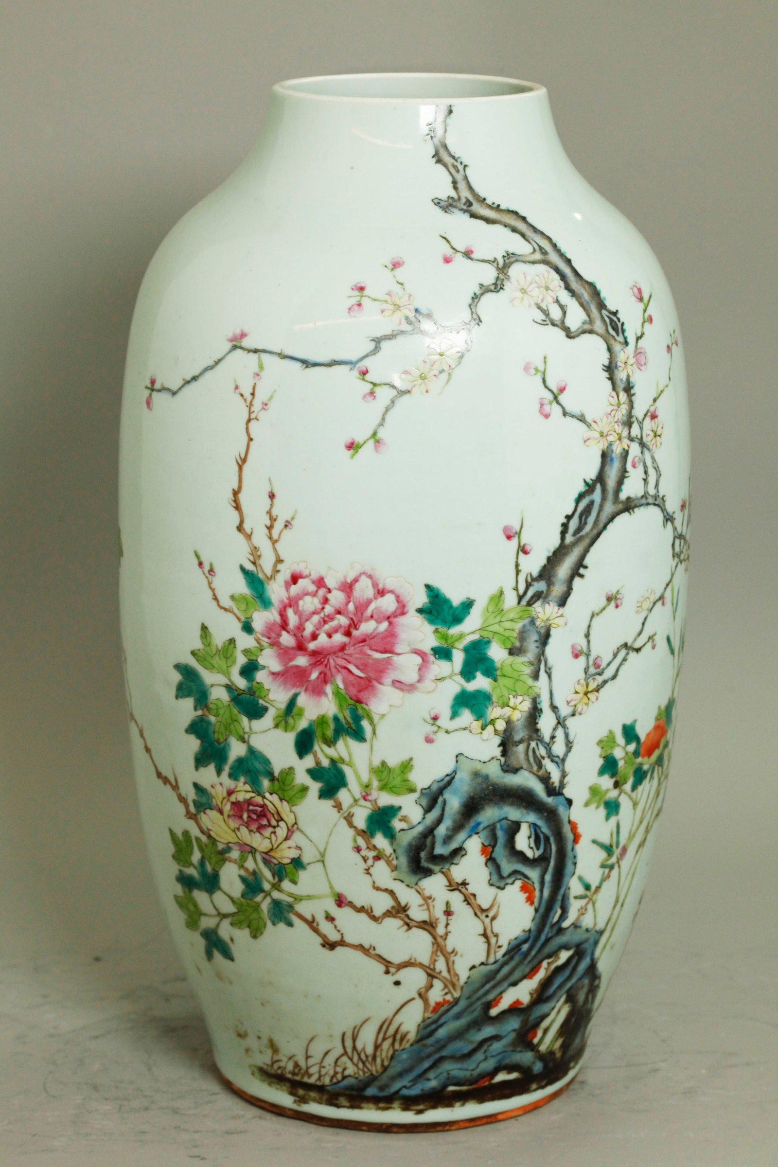Lg Chinese Qing Famille Rose Enamel Porcelain Vase: Large Chinese Qing Dynasty Famille Rose Porcelain Vase well enameled with a garden rock, flowering prunus branches, peonies and bamboo; the recessed base in clear glaze. Height 17 1/4 inches X