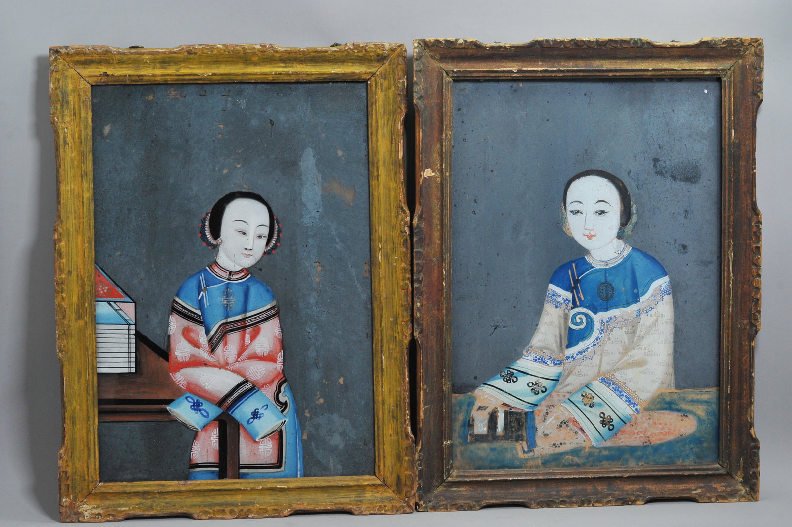 Opposing Pr Chinese 19C Reverse Glass Paintings: Opposing and complimentary Pair Chinese mid 19th Century Reverse Glass Paintings on old wavy glass, 1/2 Length Portraits of Beautiful Chinese Ladies, a left looking Lady with Books and a right looking