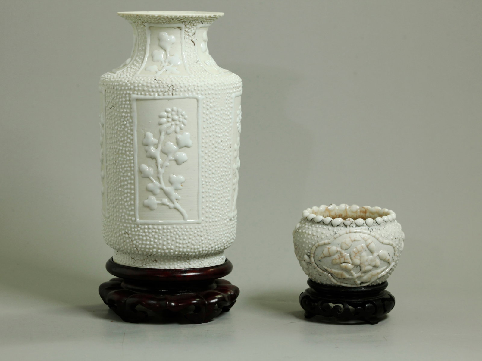 2 Chinese Blanc De Chine Glazed Biscuit Porcelains: 2 Chinese Blanc De Chine Glazed Biscuit Porcelains, a Vase and a Brush Washer, each decorated with drops of milk-white glaze; the vase with 4 panels to sides with stems of flowers repeated on the neck