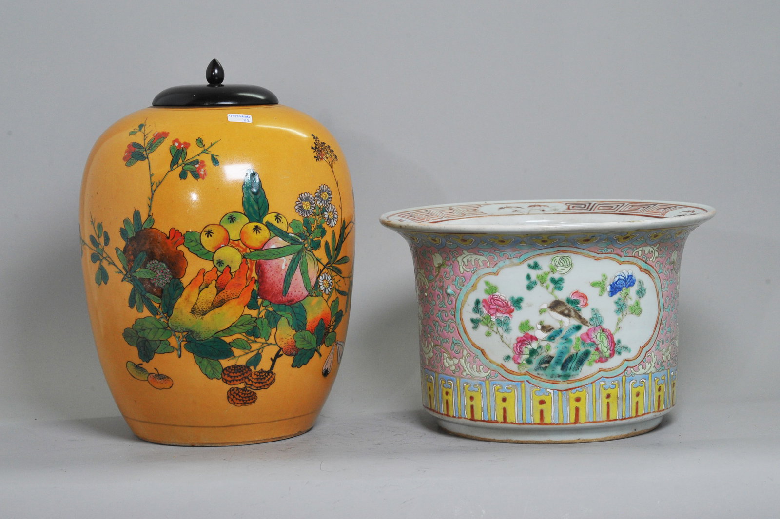Chinese Enameled Porcelain Gourd Jar & Planter: Chinese Enameled Porcelain Gourd Jar with pale orange glaze and Auspicious fruit to the front and calligraphy to the reverse, wood cover and stamped Factory mark to recessed base; together with a roun