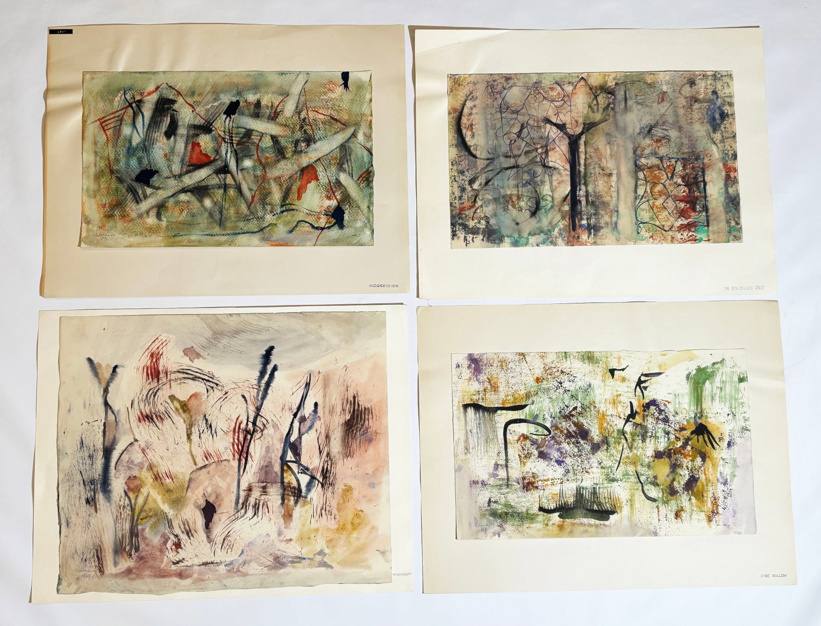 Walter Levy (Lewy); 4 Abstract Watercolors 1969-71: Walter Levy (Lewy); 4 Abstract Watercolors on watercolor paper mounted to white paper with titles, "Windswept," "Aggression," "Sing Willow," and "In Excelsis Deo." Signed and dated 1969-71. The larges