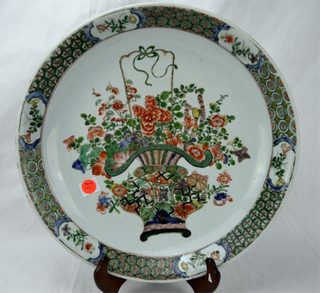 Kangxi Chinese Porcelain Famille Verte Charger: Fine and large famille verte charger, the center with a well painted basket of flowers in wucai enamels, the edge with brocade borders. Shop mark in double rings to base. Kangxi period. Provenance: Pe