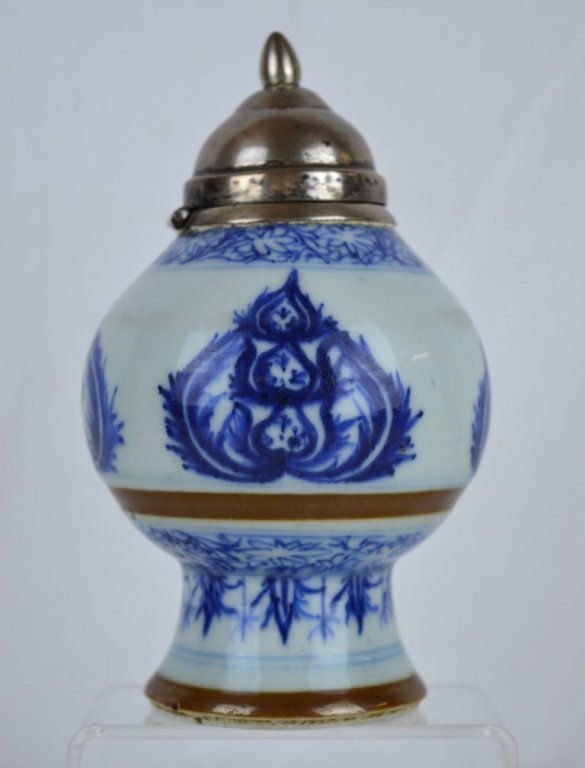 Kangxi Chinese Porcelain B & W Silver-toped Container: Chinese blue & white porcelain container now with a Middle Eastern silver metal hinged top. The porcelain, Kangxi. Height 6 inches (15.5 cm) The top of the porcelain reduced to accommodate the silver 