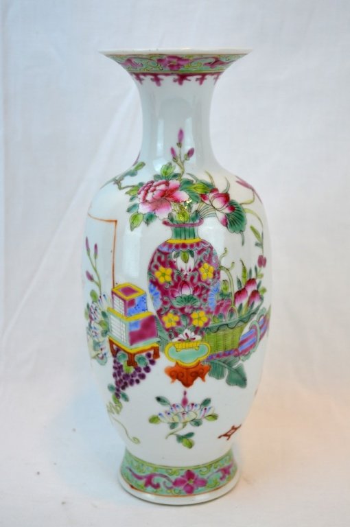Early 20th C Chinese Famille Rose Baluster Vase: CHINESE PORCELAIN Famille Rose baluster vase incised and painted with scrolls, basket, and vases of flowers, Republic Period. Underglaze copper red painted mark, CHINA. Height 9 1/2 inches (24 cm) Bas