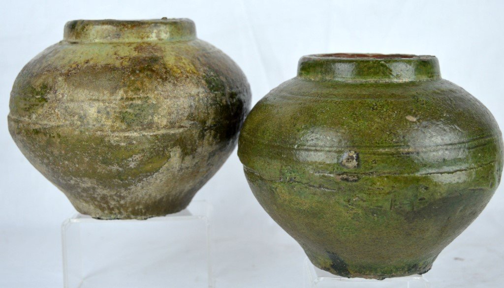 Han Dynasty Pair Of Chinese Pottery Urns, De Batz Coll.: Pair of green glazed pottery urns, Han dynsaty. The base of each with labels from the George de Batz Collection. Height 4 3/4 inches (12 cm) Good condition, one with glaze more irridescent Any conditi