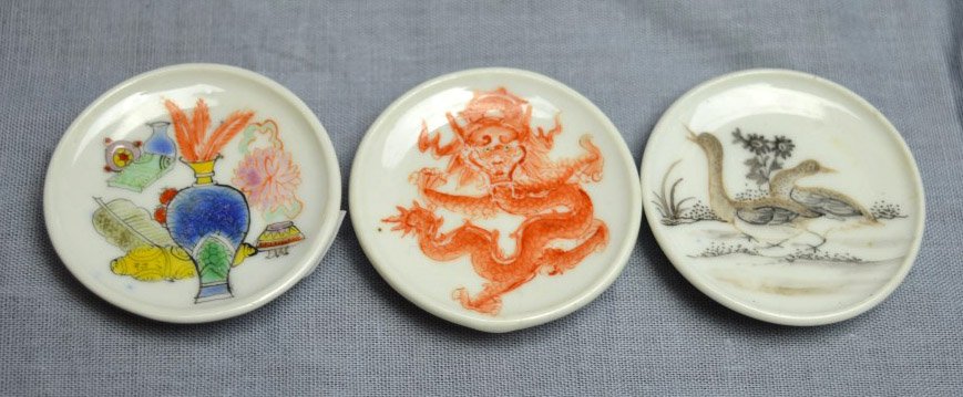 3 Chinese Porcelain Snuff Dishes: 3 Chinese Porcelain Snuff Dishes; one with a hand painted double goose design, mark to base; one with hand painted objects design, mark to base; one with dragon iron red. Each diameter 1 1/5 inches (4