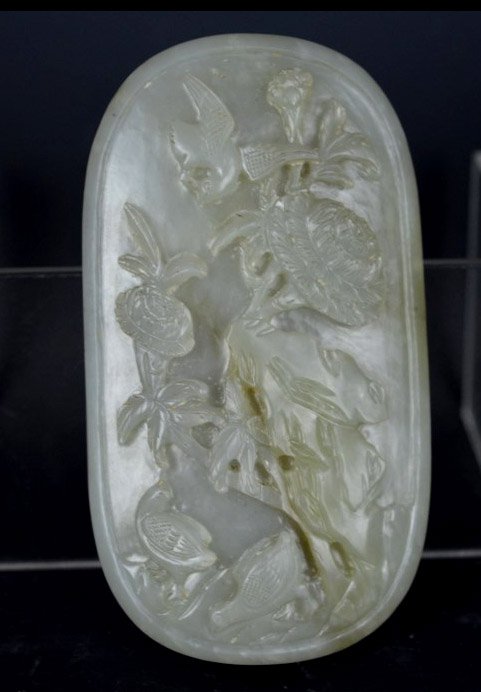 Large Pale Celadon Jade Plaque Deeply: Large Pale Celadon Jade Plaque Deeply Large Pale Celadon Jade Plaque Deeply Carved with 3 Birds and Peonies around a Rock. Height 3 5/8 inches (9 1/2 cm). Good condition Any condition statement is giv