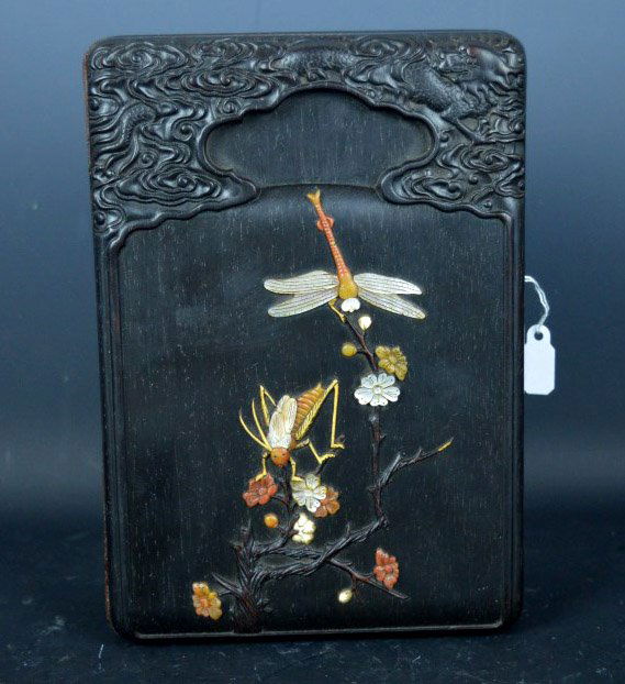 Carved Inlaid Blackwood Covered Box: Carved Inlaid Blackwood Covered Box Carved Inlaid Blackwood Covered Box with a design of insects and flowers in carved horn and shell on the top. Length 7 inches (18 cm.). Good condition, some small s