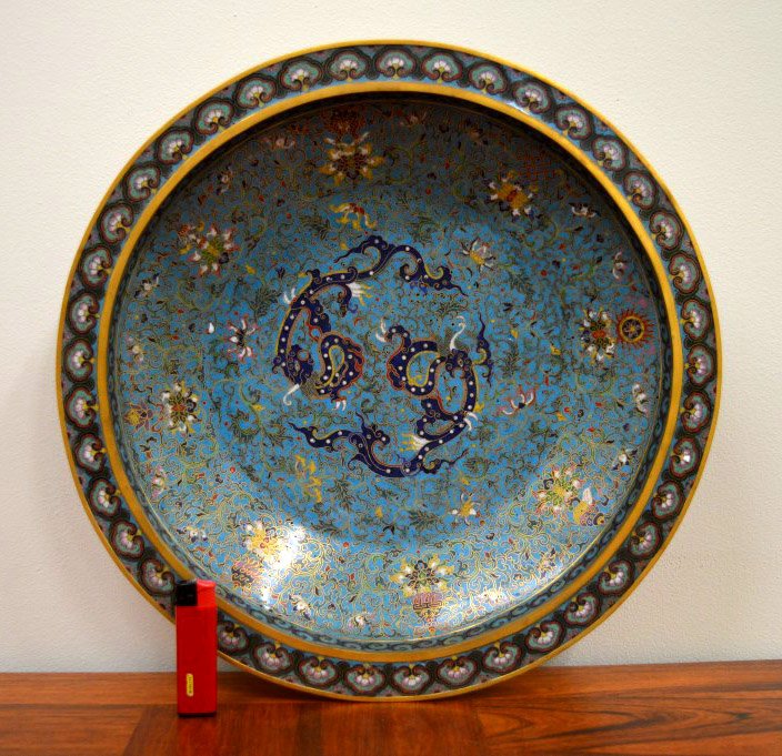 Large Antique Chinese Cloisonne Dragon Plate: Antique Large Chinese Cloisonne Dragon Plate on Gilt bronze taotie mask feet, Mark in cloisonné on the base. DIA: 15 1/2inches (39.5cm). Good condition.