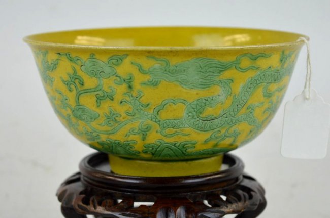 Chinese Green & Yellow Porcelain Dragon Bowl: Chinese Green & Yellow Porcelain Dragon Bowl; underglaze blue Jiajing mark on clear glazed base and probably of the period; Incised Shou Tree on inside. Scratches to enamel. Diameter 6 inches (15 cm.)