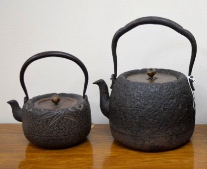 2 Iron Water Kettles w Bronze Tops: 2 Iron Water Kettles w Bronze Tops . Height of larger without handle 5 1/2 inches (14 cm.).