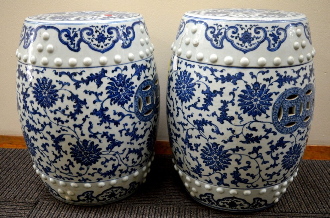 Pr. Chinese B & W Porcelain Barrel-Shaped Garden Seats: Pr. Chinese B & W Porcelain Barrel-Shaped Garden Seats. one with long body line, other one with old hairline to inside.Height 18 3/4 inches (47.5 cm.).