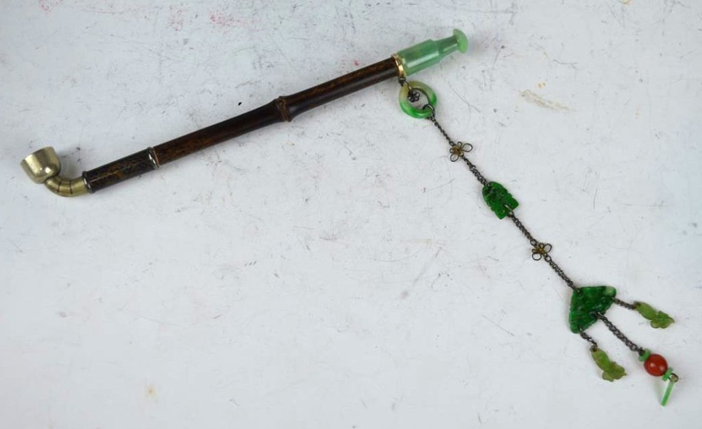 Very Fine Chinese Bamboo Jadeite, Silver Wire Pipe: Very Fine Chinese Pipe with Bamboo, Jadeite, and a Bronze bowl, part stem inlaid with Silver Wire. Good condition. Provenance: Old Long Island Collection. Length 6 1/4 inches (16 cm.).