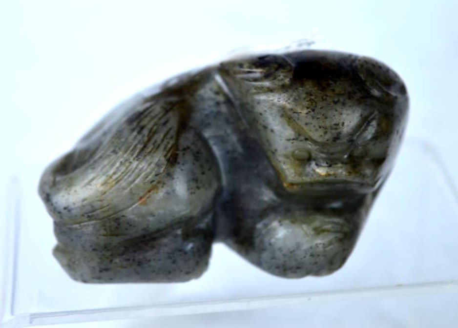 Ming Chinese Dark Spotted Jade Animal: Ming Dynasty Chinese Dark Spotted Jade Animal with a fierce expression and close set eyes. Good condition. Width 2 3/4 inches (7 cm.).