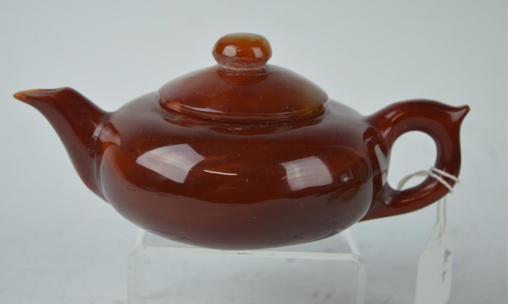 Fine Chinese Polished Carnelian Agate Teapot: Fine Chinese Polished Carnelian Agate Teapot. Good condition. Length form handle to spout 6 1/4 inches (16 cm.).