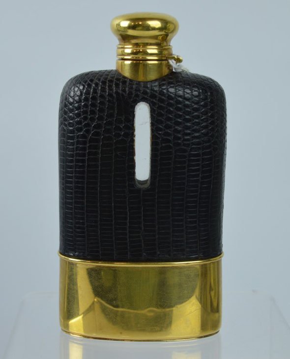 18K Gold, Glass & Lizzard Pocket Dress-Flask: 18K Gold, Glass & Lizzard Pocket Dress-Flask, the removable cup-base marked "18K X 100 1/8 Pint" on base and neck of hinged cover both with a probable "Gorham" mark of lion over anchor; 28dwt of 18K G