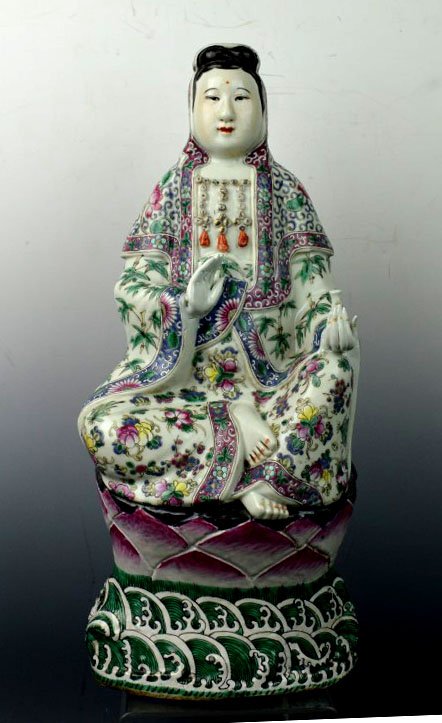 Late Qing Chinese Enameled Porcelain Guanyin: Late Qing Chinese Enameled Porcelain Guanyin seated on a lotus throne above waves, her robes detailed with flowers and bamboo. Incised mark to base. Good condition, both hands with overpainting. Heigh