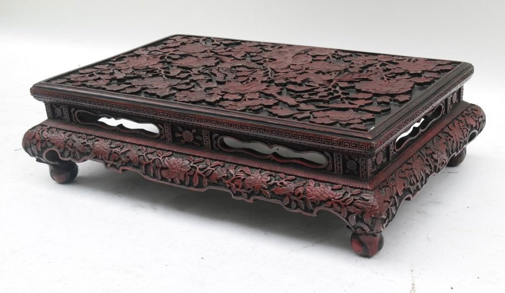 Ornate Saki Table: Red, black carved saki table. [28" L x 18" D x 8" H]. Good condition.