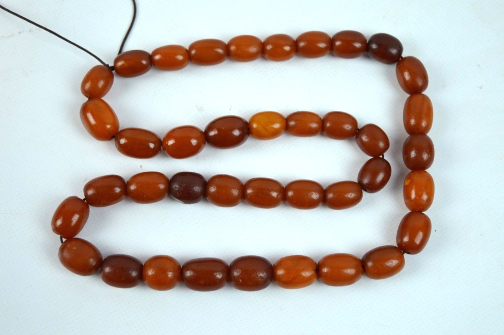 32.5 Grams Antique Butterscotch Amber Oval Beads (1 of 4)