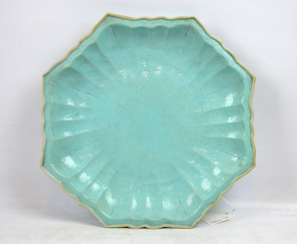 19th C Chinese Turquoise Octagon Porcelain Plate: Large 19th century Chinese Turquoise Octagon Porcelain Plate, the opaque glaze applied on the biscuit. Good condition, small glaze flake under one point. Largest diameter 11 1/8 inches (28.5 cm.).