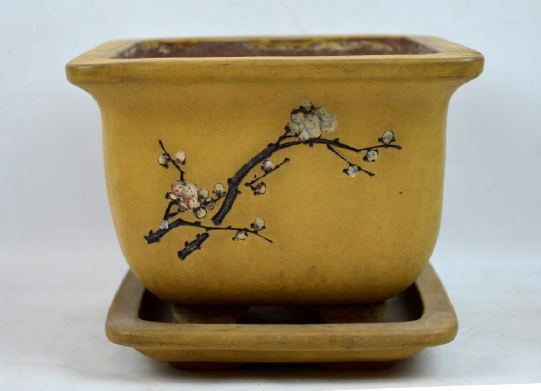 Good Chinese Incised Yixing Planter & Tray: Good Chinese Incised Yixing Planter & Tray; the outsides covered in buff Yixing and carved with bamboo & Prunus between calligraphy; impressed marks to bases. Natural plant stains inside. Total height