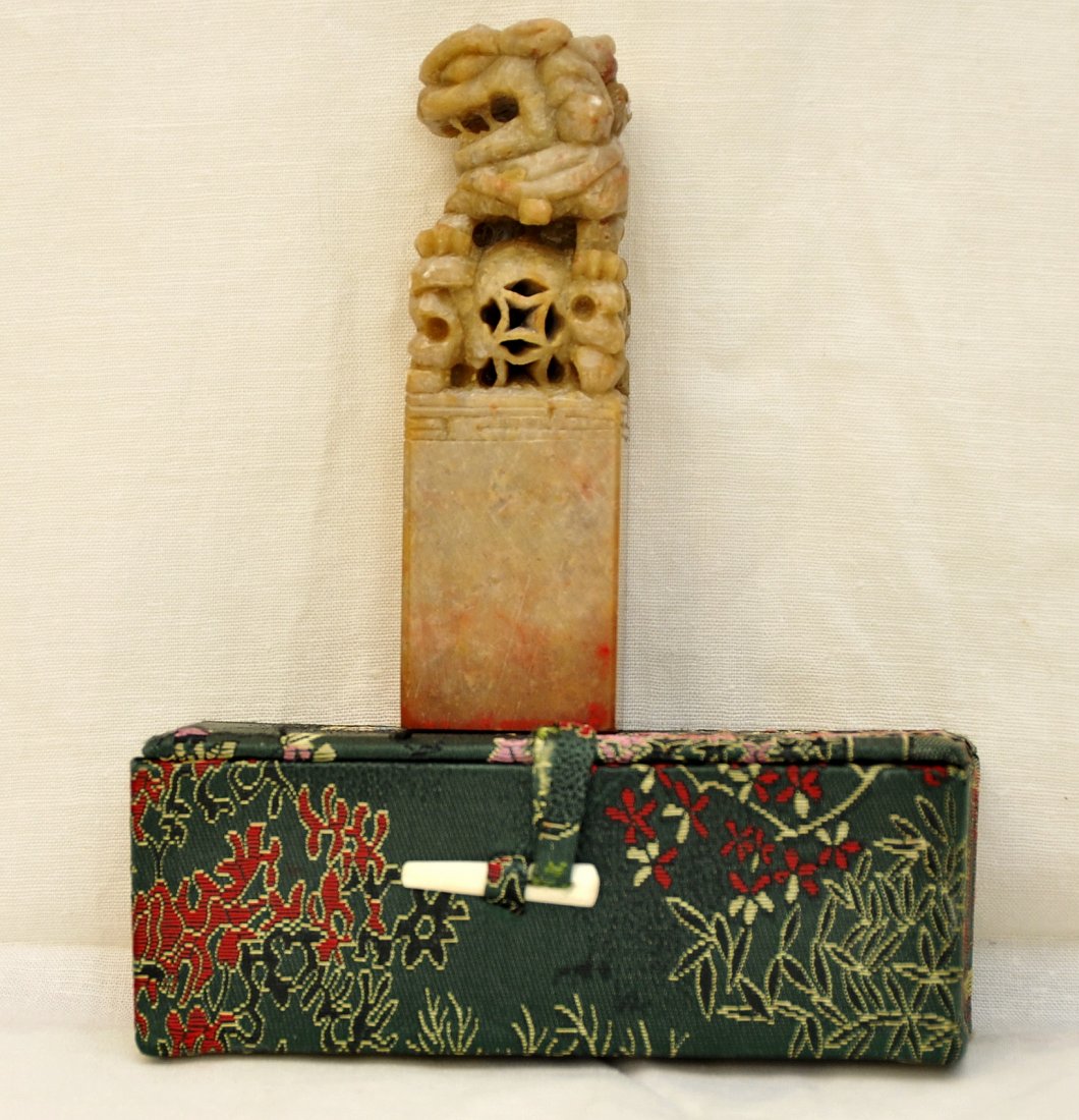 Chinese Foo Lion soapstone carved stamp.: Foo dog stone carved stamp. 4,25 inches tall x 1,25 inches wide with storage box.