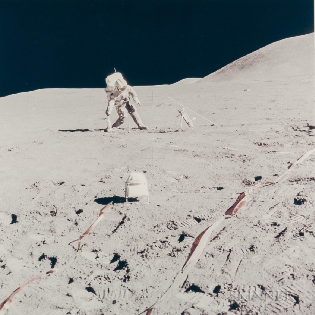 James Irwin (American, 1930-1991): James Irwin (American, 1930-1991) David Scott leaning in the Moon's one sixth gravity, lunar-science station, EVA 2, Apollo 15, August 1971. Numbered 'NASA AS15-87-11847' (NASA MSC) in red on the re