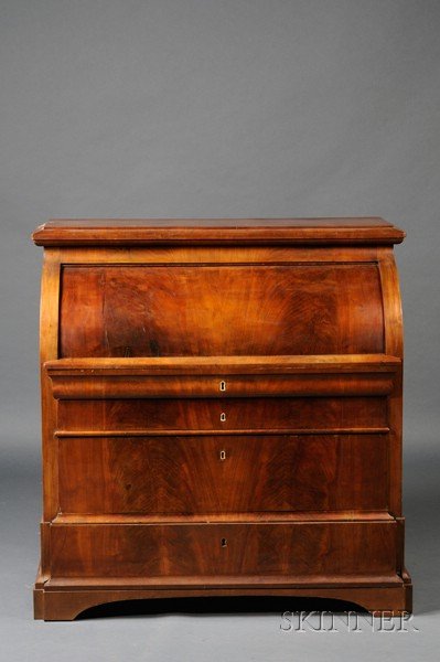 Late Biedermeier Fruitwood Cylinder Desk, second qu: Late Biedermeier Fruitwood Cylinder Desk, second quarter 19th century, with stepped cresting and fitted interior above three long drawers, on block feet, ht. 46, wd. 43, dp. 24 in.